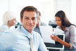Successful businessman taking break from meeting
