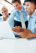 Foto: Successful business group working on laptop Successful business group working on laptop