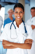 Confident female doctor leading her team