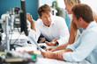 Business colleagues sitting at office discussing