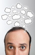 man with Speech Bubbles over his head
