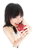 Fun woman with red apple and measure tape on the glass scales