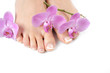 Beautiful feet with perfect spa french nail pedicure.isolated