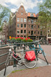 Bike parked on an Amsterdam bridge