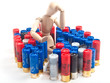 Foto: Man figure on top of fire cartridge pile Man figure on top of fire cartridge pile