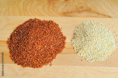 Photo: Red and white quinoa on a cutting board Red and white quinoa on a cutting board