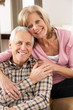 Happy Senior Couple Relaxing At Home