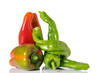 Red and green peppers on white background Red and green peppers on white background