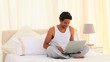 Video: Dark haired man sitting with his laptop Dark haired man sitting with his laptop