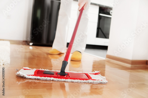 Photo: House cleaning -Mopping hardwood floor House cleaning -Mopping hardwood floor