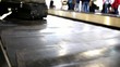 Baggage belt with case moving