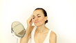 Video: Young attractive woman cleaning her face with cotton pad Young attractive woman cleaning her face with cotton pad