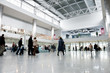 People in modern business centre hall