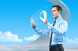 Businessman using futuristic hologram interface keyboard