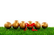 Easter golden eggs on fresh grass Easter golden eggs on fresh grass