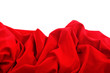 Red satin fabric against white background Red satin fabric against white background