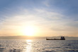 Foto: Bulk-carrier ship at sunset Bulk-carrier ship at sunset