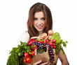 woman holding a bag full of healthy food. shopping .