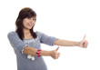 woman with two thumbs up