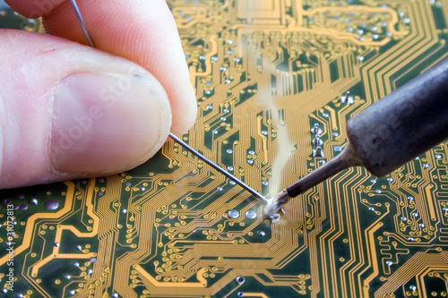 Foto: Soldering an electronic circuit Soldering an electronic circuit