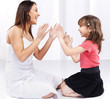 Woman and child playing Woman and child playing