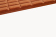 Stick of dark chocolate on a white background