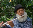 Photo: Old African American Musician Playing Flute Old African American Musician Playing Flute