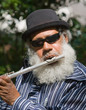 Photo: Old African American Musician Playing Flute Old African American Musician Playing Flute