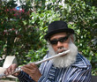 Photo: Elderly Musican Playing Flute Elderly Musican Playing Flute