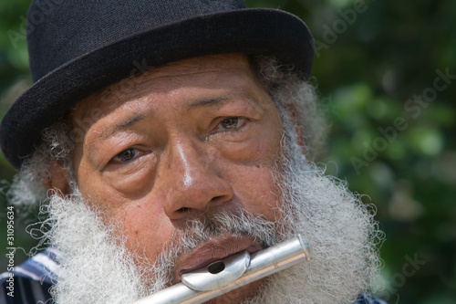 Photo: Elderly African American Man Playing Flute Elderly African American Man Playing Flute