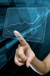 a woman hand make a graph on a digital screen