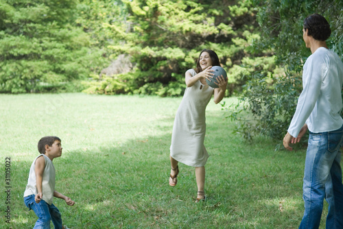 Photo: Family playing ball Family playing ball