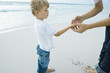 Father and son on beach