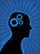 Man head silhouette with gear wheels inside