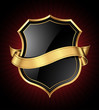 Vector: Black shield with a golden frame and a ribbon for your message Black shield with a golden frame and a ribbon for your message