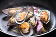 fresh mussels cooking in pan