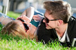 Foto: Happy teenage couple playing outdoor Happy teenage couple playing outdoor
