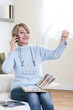 Mature woman looking at photos