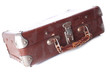 old dusty brown leather suitcase