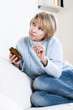 Pensive Woman Taking Pills