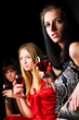 Young women relaxing in a bar