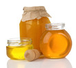 glass pot full of honey and stick glass pot full of honey and stick