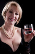Happy Mature Woman With Drink