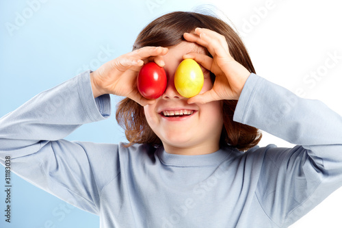 Illustration: Little boy has fun with easter eggs Little boy has fun with easter eggs