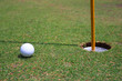 Golf ball at hole