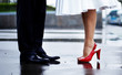 Feet of the groom and the bride