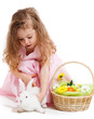 Girl playing with Easter bunny Girl playing with Easter bunny