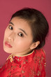 Chinese girl in red cheongsam Chinese girl in red cheongsam