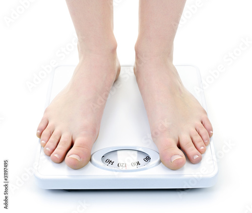 Photo: Feet on bathroom scale Feet on bathroom scale