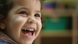 Preschooler laughing and clapping hands